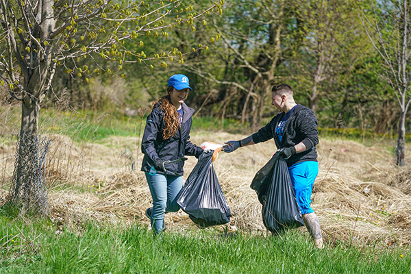 Employees picking up trash
